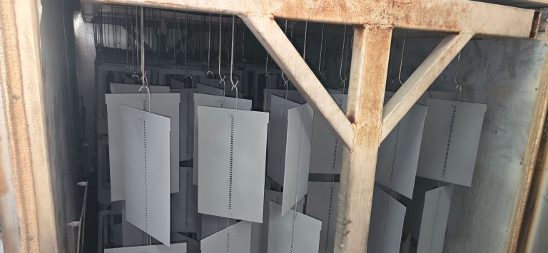 Rectangular panels hanging from a workshop rack