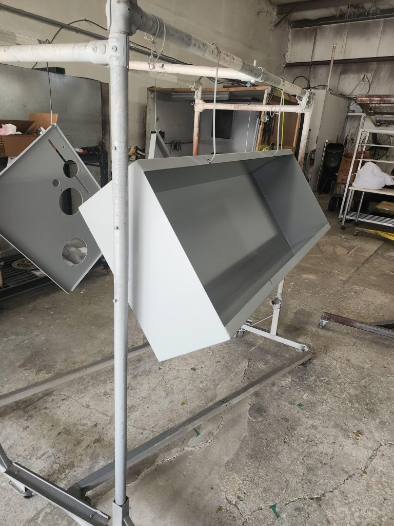 Large angular enclosure suspended in the workshop