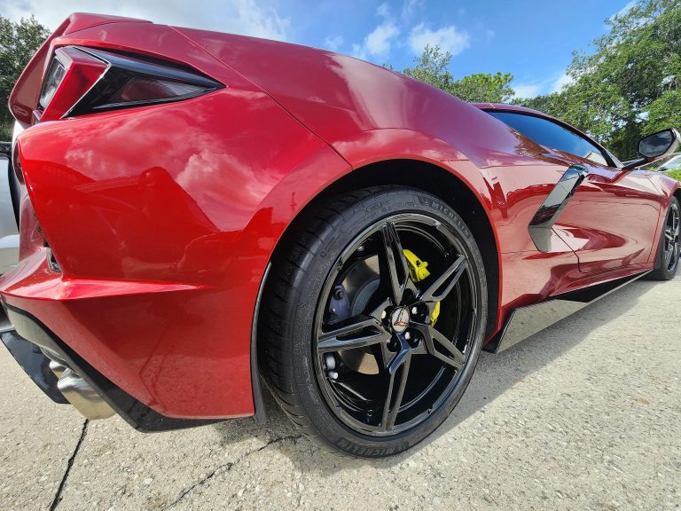 Rear wheel fitted to a sports car outdoors