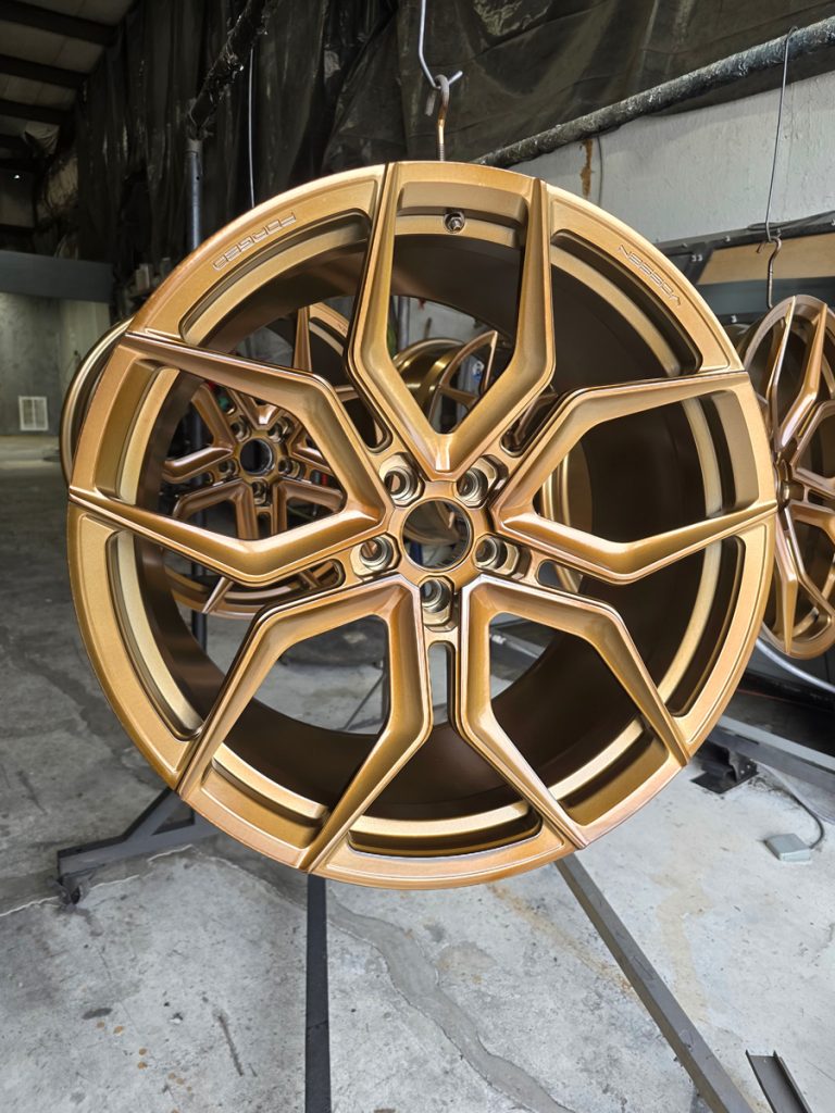 Split-spoke wheel suspended in the workshop