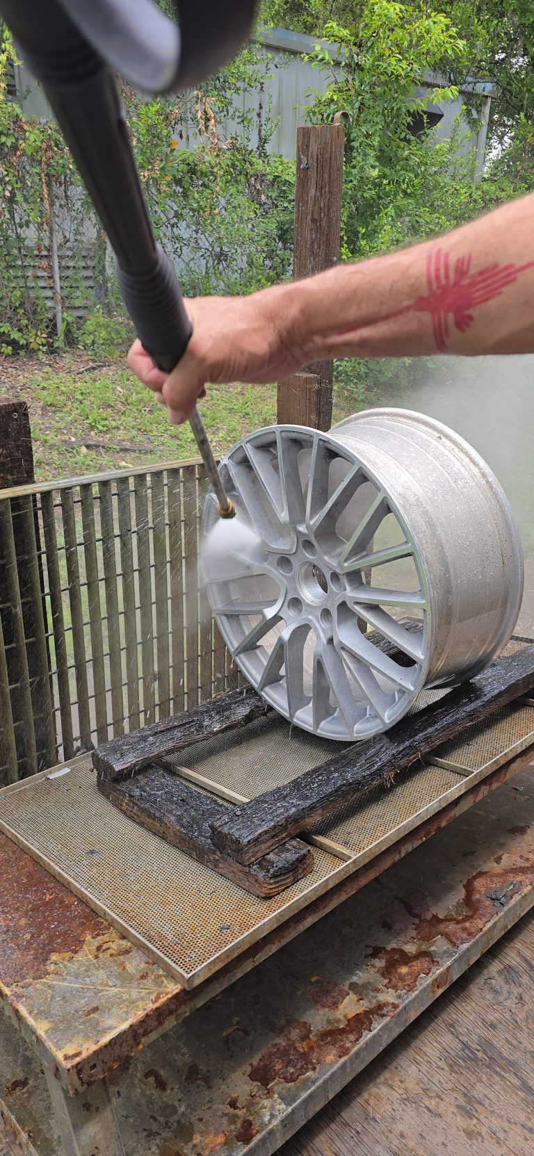 Wheel on an outdoor rack during the finishing process